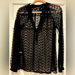 Really cute black lace top! Size is an XS from Express!